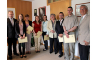  - Gruppenbild nach der Ernennung mit (v.li.): Landrat Michael Adam, Alexandra Pöhn, Simone Kasberger, Katrin Pfeffer, Natalia Janik, Sonja Morgenstern, Martin Berger, Heiko Nerl und Anton Weghofer. Foto: Langer/Landratsamt